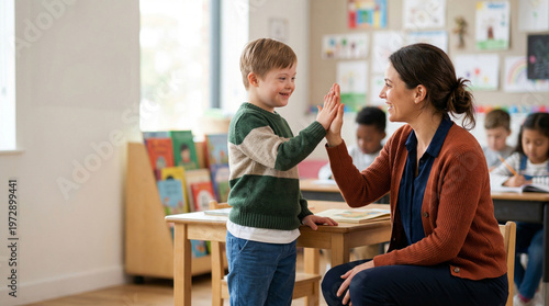 Female teacher giving a high five to a young boy in a bright classroom. educational success, supportive learning, school life.