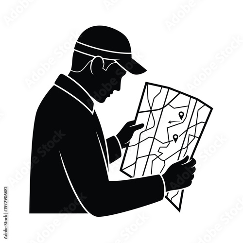 Man in cap looking at map.