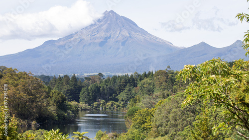 Mount Taranaki volcano with lake and forest panorama New Zealand scenic travel landscape