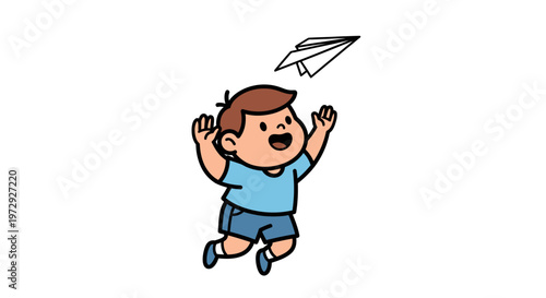A cute boy is jumping and playing with a paper airplane outside on a sunny day.