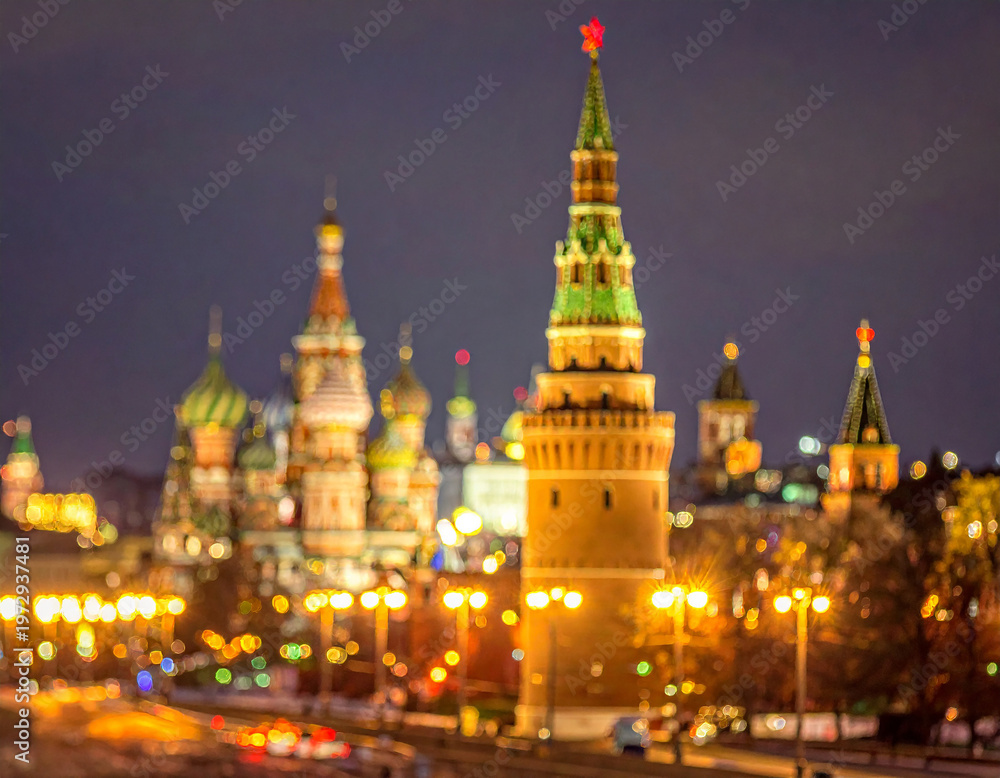 Obraz premium Moscow Kremlin illuminated at night with colorful domes and glowing streetlights creating a vibrant cityscape with