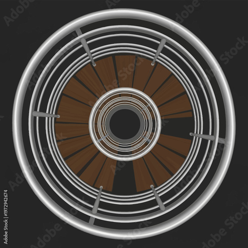 High-angle top-down view of a spiral staircase with circular chrome handrails and brown wooden steps, creating a concentric geometric pattern against a dark gray background.