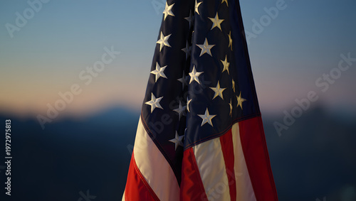American Flag: An American flag flutters proudly against a serene backdrop, its stars and stripes a symbol of freedom, unity, and the spirit of a nation.