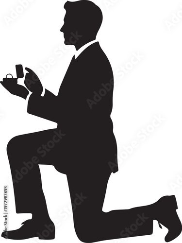 Man kneeling holding ring box proposal