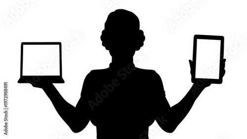 Black silhouette of person holding laptop and tablet symbolizing multitasking and technology