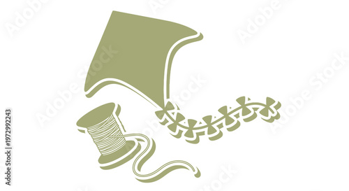 Spool of thread with scissors and fabric.