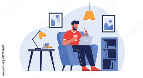 Man sitting in blue armchair working on laptop while drinking coffee in cozy home office environment with lamp.