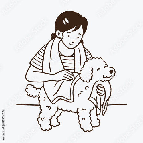 Woman Drying Her Dog After a Bath