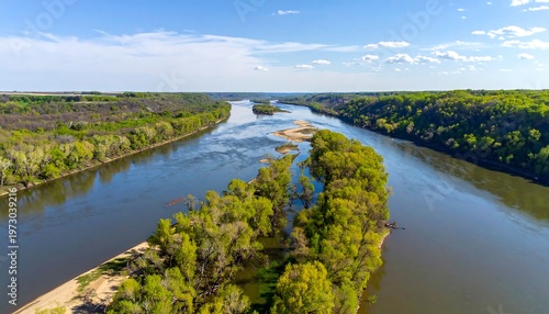 Aerial view of a serene river with lush greenery