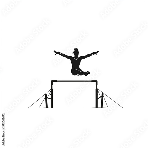 Athlete jumping over hurdle in track.