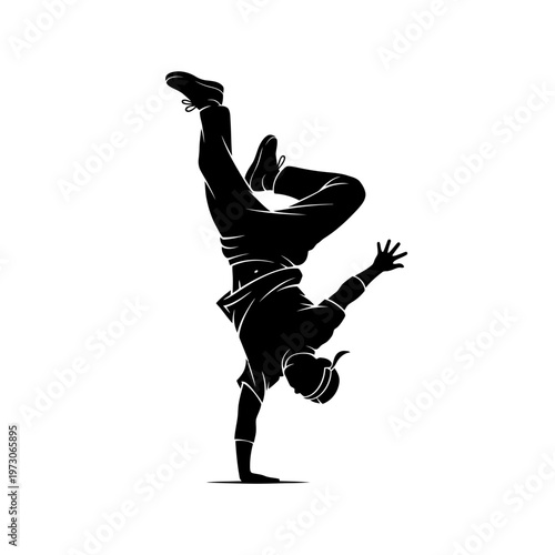 Man doing a handstand in black silhouette.