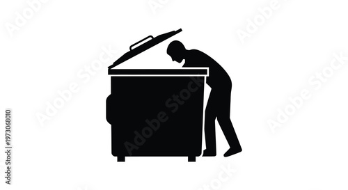 Man looking into an open dumpster a stark black silhouette