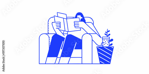 A person relaxes in a chair engrossed in reading a book