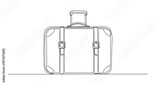 A vintage suitcase with a retractable handle and buckled straps rests on a surface