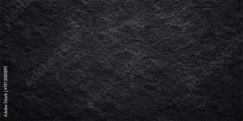 A dark black leather and fabric material texture shows a rough macro pattern on a blank textile surface backdrop for a grunge cloth design