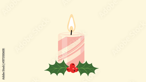 Pink striped Christmas candle with a burning flame and holly leaves with red berries, festive holiday decoration on beige background.