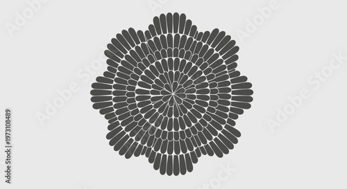 Intricate circular pattern of dark gray teardrop shapes radiating outward