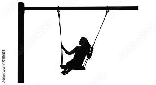 A young woman joyfully swinging on a rope swing black silhouette