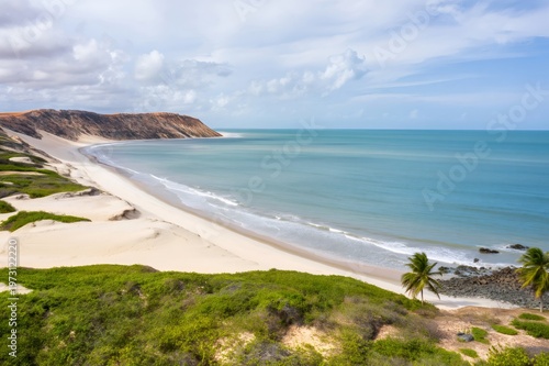 Jericoacoara beach coastline with sand dunes and tropical ocean
