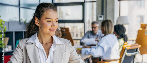 White operations manager reviewing report with confidence