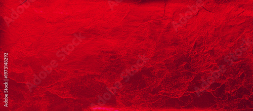 Red textured vintage background with an image of an old, dilapidated concrete wall, painted with paint cracked over time. Can be used for wallpaper, design                               