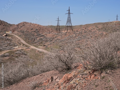 Highway A3. Early spring landscape. Kapshagay Reservoir. Konaev city.