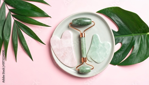 Relaxation and rejuvenation: Gua Sha tools and tropical leaves for serene wellness