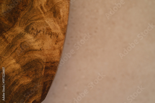 split background with wooden surface and concrete texture divided into two sections showing contrast between natural and industrial materials concept of design construction and product presentation