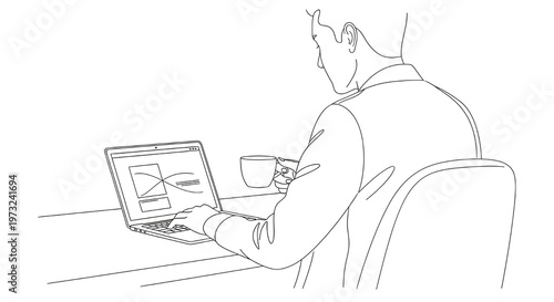    Young businessman sitting at desk while holding a warm cup of coffee and working on his laptop computer screen