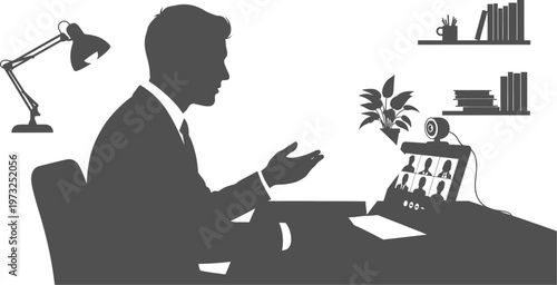 Businessman conducting a remote video conference call on a laptop silhouette