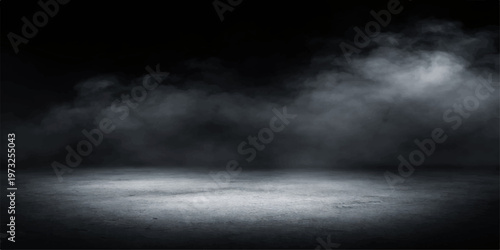 Dark stormy clouds gather in a black night sky, creating a moody nature background with a misty texture of smoke and fog over a dark weather landscape
