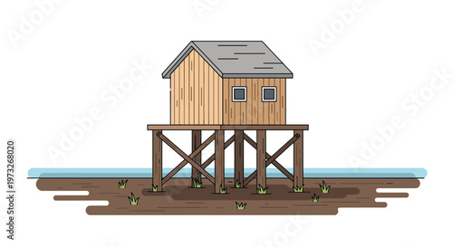 A charming wooden cabin with a grey gabled roof and small square windows stands elevated on a sturdy timber stilt platform over brown earth and thin grass.
