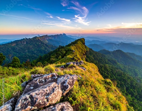 Serene dawn landscape unveils vibrant hues. Mountains cascade into distance, showcasing lush forests and soft pastel sky reflections