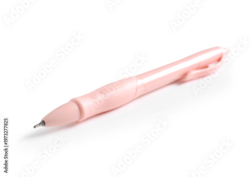 Beige pen on white background