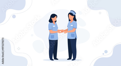 Two nurses in blue uniforms shaking hands, teamwork in healthcare concept