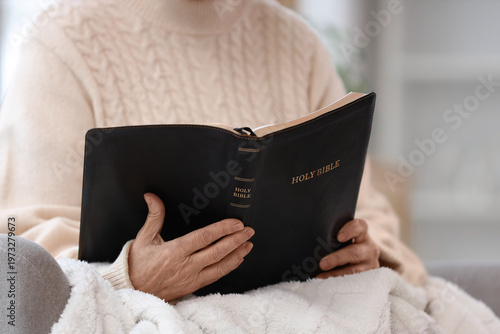 Christian senior woman with...