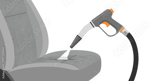A professional automotive detailing tool performs deep extraction cleaning on a gray fabric car seat using a powerful spray and vacuum nozzle attachment.