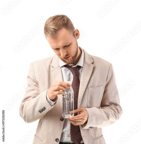 Young man with bottle of wa...