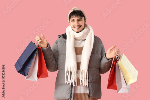 Young man in winter clothes...