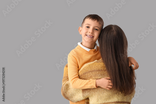 Happy little boy with his m...