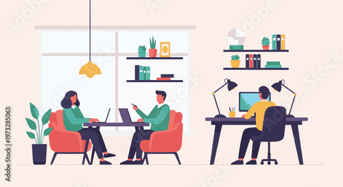 Two people working on laptops in a modern office setting 1.