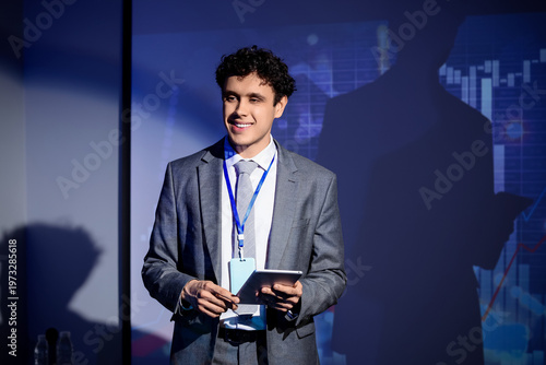 Male business speaker with ...