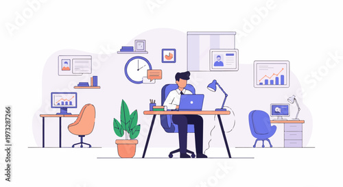 Man working diligently at his desk with a laptop.