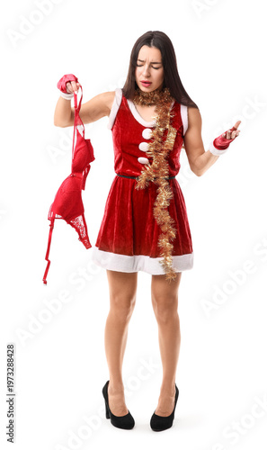 Drunk young woman in Santa ...