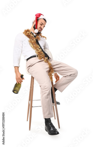 Drunk young man in Santa ha...