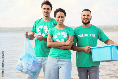 Young volunteers with trash...