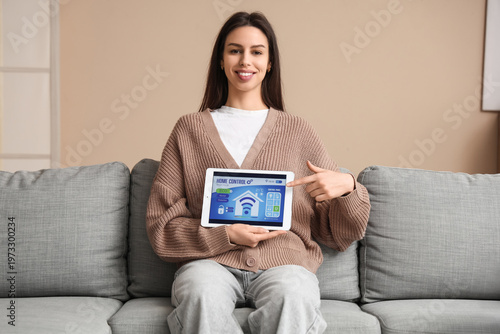 Woman pointing at smart hom...