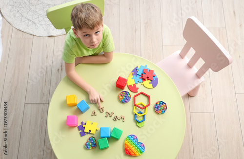 Little boy with word AUTISM...