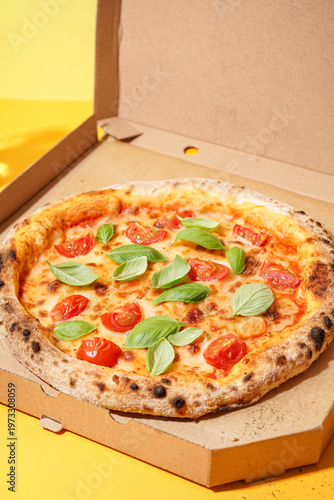 Carton box with tasty pizza...