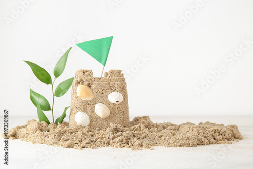 Castle made of sand with pl...